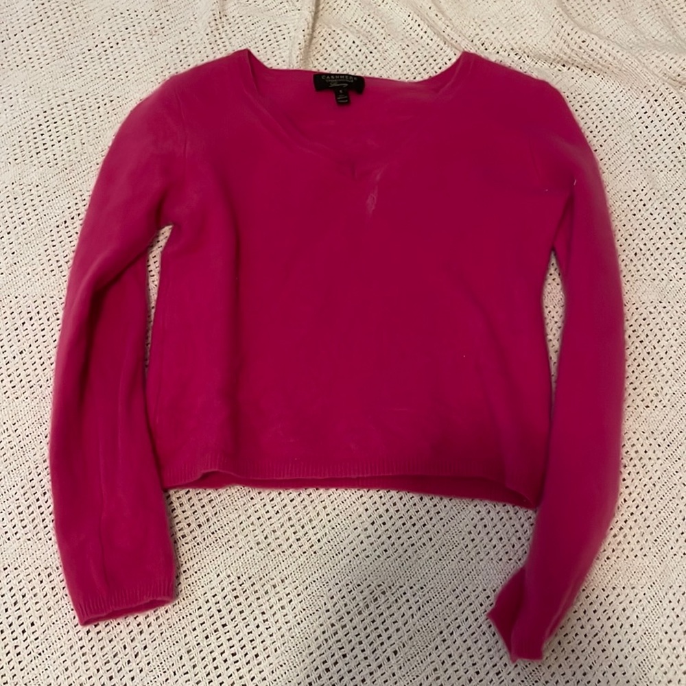 Small hot pink sweater. Fits like an XS.